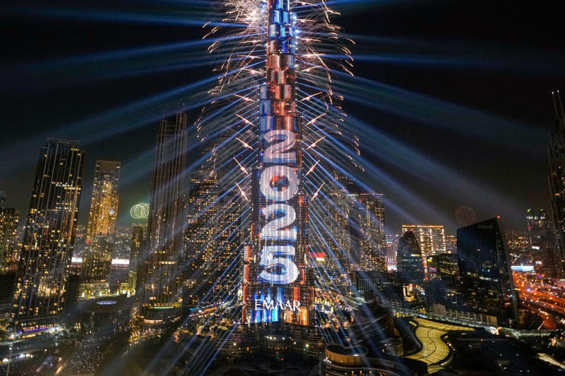 Fireworks at Burj Khalifa, the tallest building in the world, in Dubai, UAE; Photo source: guardian; Photographer name: Altaf Qadri