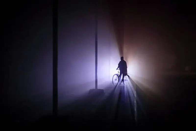 Cyclist in the night wier fog of Bangladesh; Photo source: 121clicks.com; Photographer: Mou Aysha