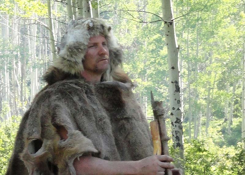 A man wearing a caveman's mask; Photo source: today.com; Name of the photographer: unknown
