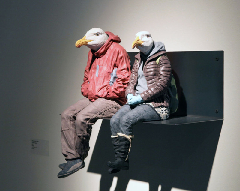 Two humanoid pigeons