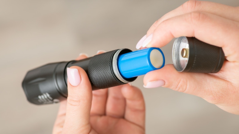 flashlight with replaceable battery; Photo source: explore.com. Photographer: Unknown