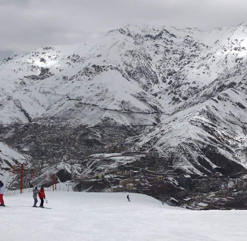 Skiers at Shamshak ski resort with a mouain view; Photo source: Google Maps, photographer: Hamidreza Kash
