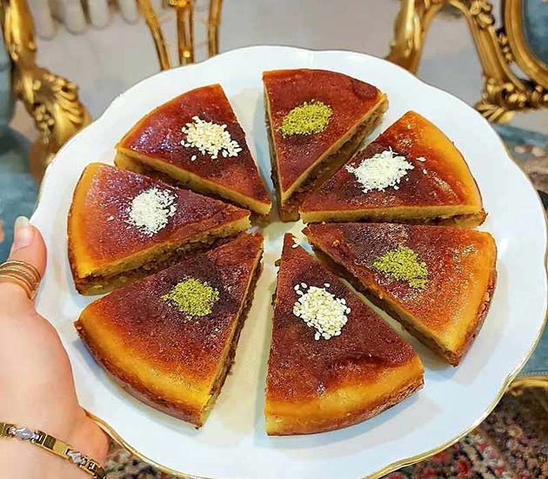 Khagine decorated with pistachio nuts and sesame, photo source: harnika.ir, photographer: unknown
