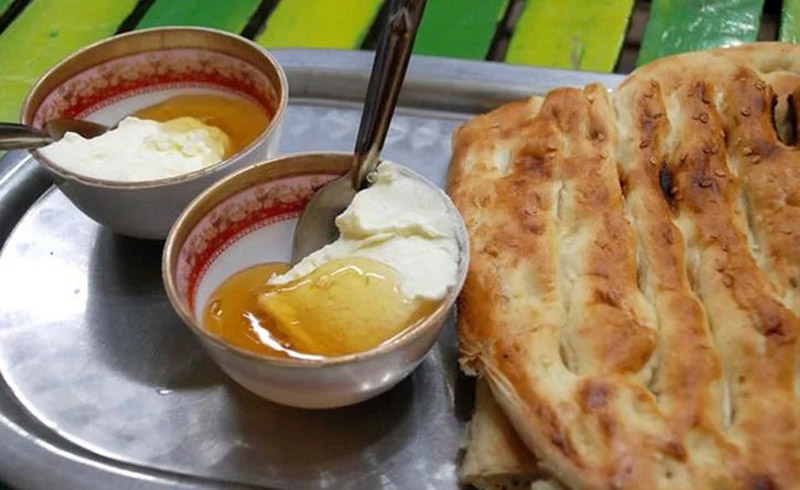 Honey, Sarshir and Berber bread; Photo source: roustaee.com; Photographer: Unknown