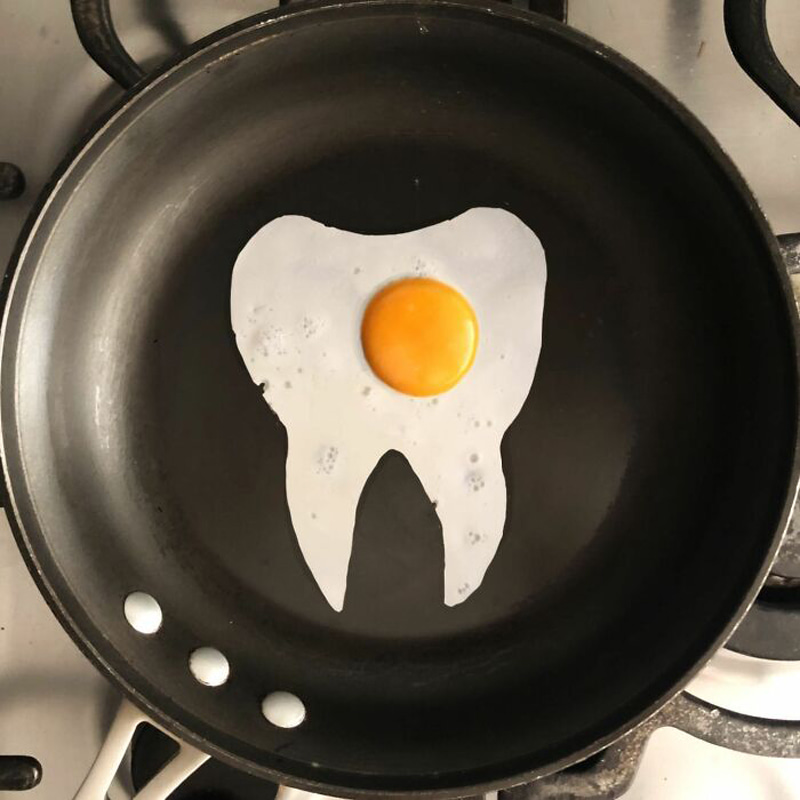 Half-faced in the shape of a tooth