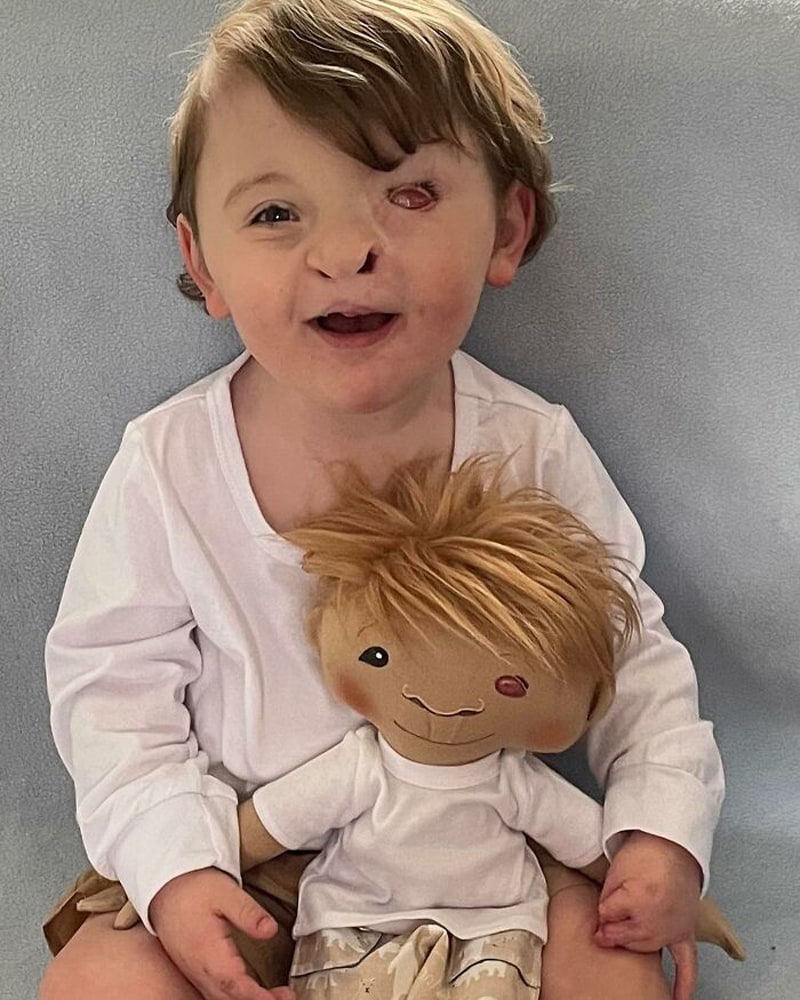 The girl in white and her doll