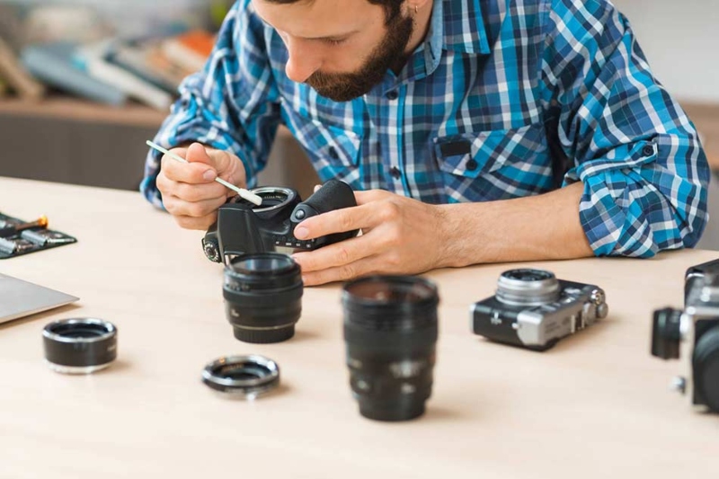 cleaning camera equipme; Photo source: photor.org. Photographer: Unknown 