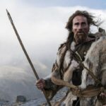 A man in prehistoric clothing; Photo source: faircompanies; Name of the photographer: unknown