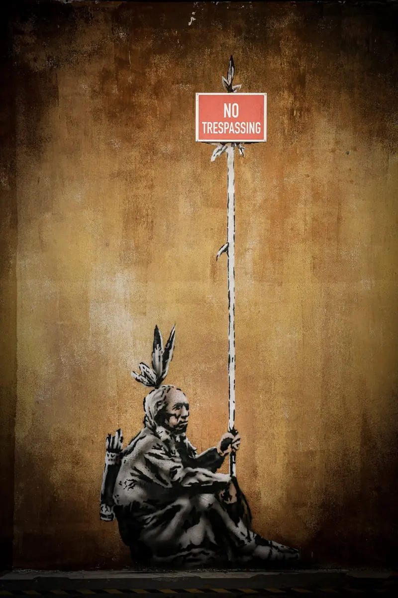 Paiing with the subject of violation of natives' rights; Banksy's effect