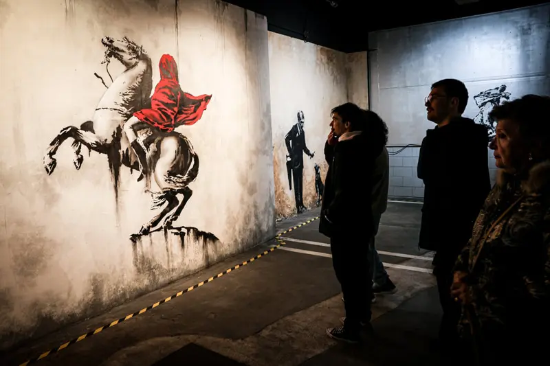 Equestrian paiing with red cape; Banksy's effect