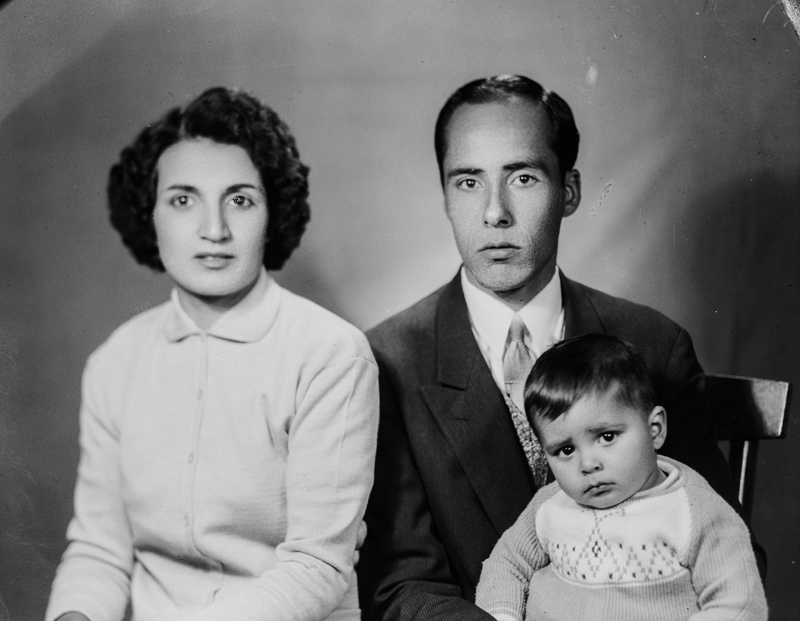 Black photo of young couple and their child in ancie Iran