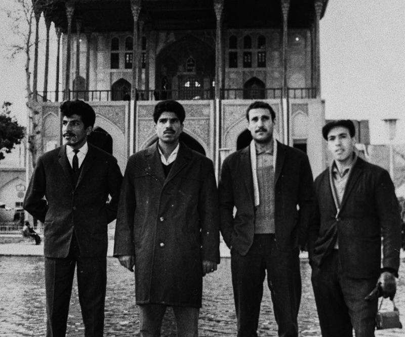 Black and white photo of four men in ancie Iran