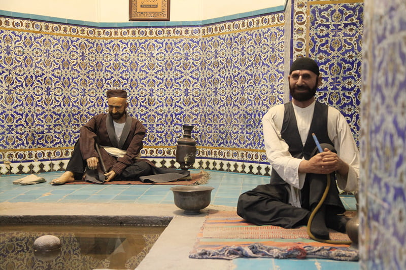 The statue of two men in the bathroom of Ganjali Khan Kerman; Photographer: Mohammad Shojaee