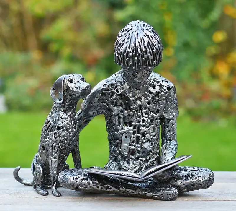 Baby and dog sculptures with recycled materials