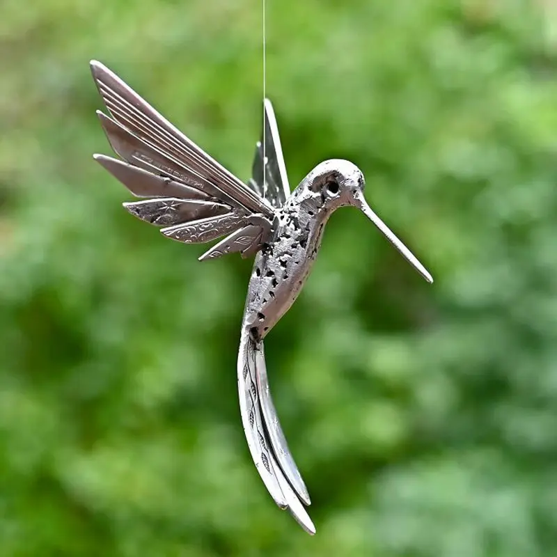 Bird statue with recycled materials