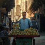 Round seller with a trolley on the streets of Cairo