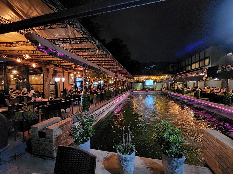 Open space café in the night; Photo Source: Google Map; Photographer: iliya hp