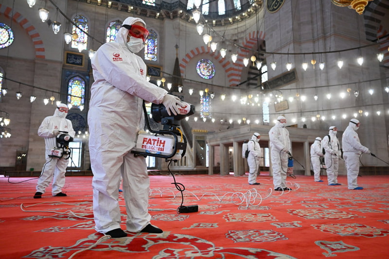 Workers disinfect Istanbul Mosque before the holy moh of Ramadan; Photo Source: Theguardian; Photographer Name: Mehmet Murat Onel