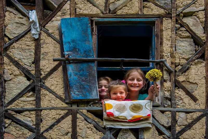Rural Children Crack Behind the Window