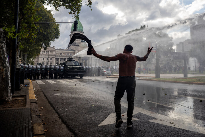 Repression of Argeinean retirees with tear gas and bullets! + Movie