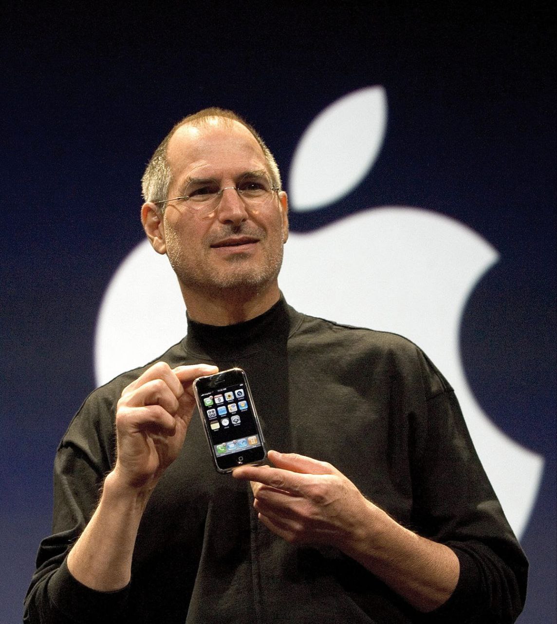 Unveiling of the first iPhone handset by Steve Jobs