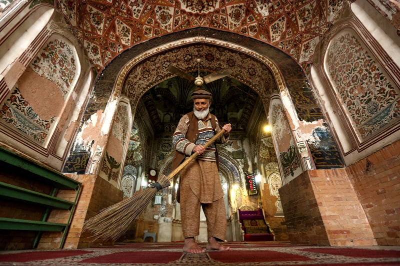 Vacuuming Mosque in Peshawar Pakistan on the occasion of the beginning of the holy month of Ramadan; Photo Source: Theguardian; Name of Photographer: Bilawal Arbab