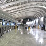 Buying a plane ticket at the airport