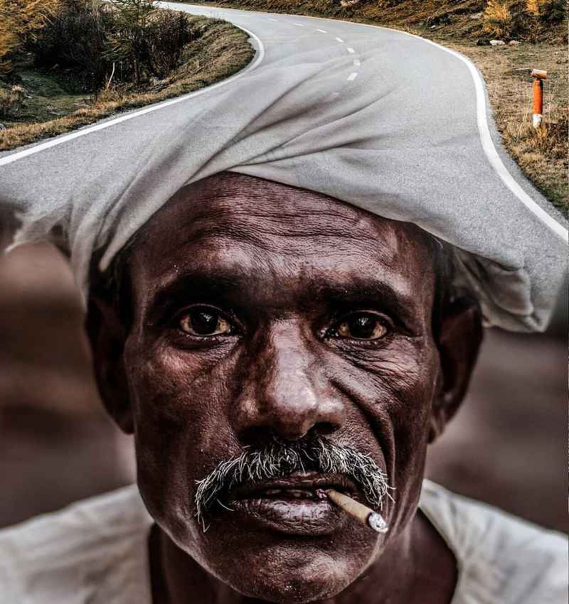 Surreal Photo of an old man turning io asphalt road