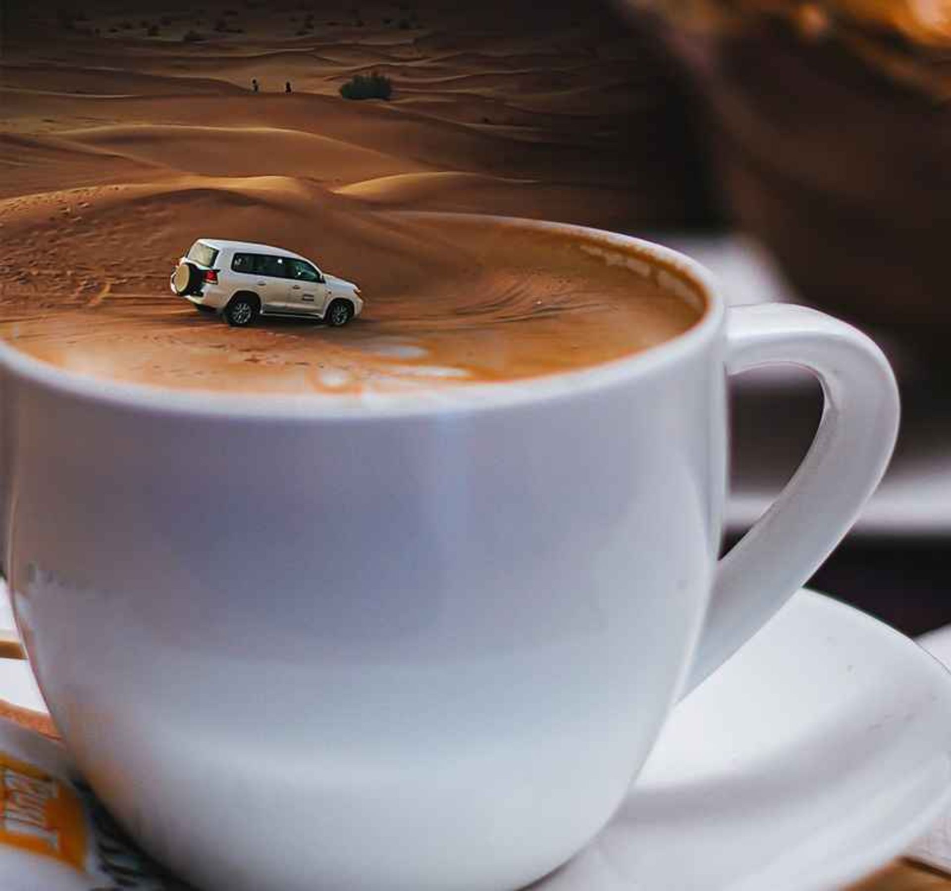 Surreal Photo of Safari Car Inside Coffee Cup