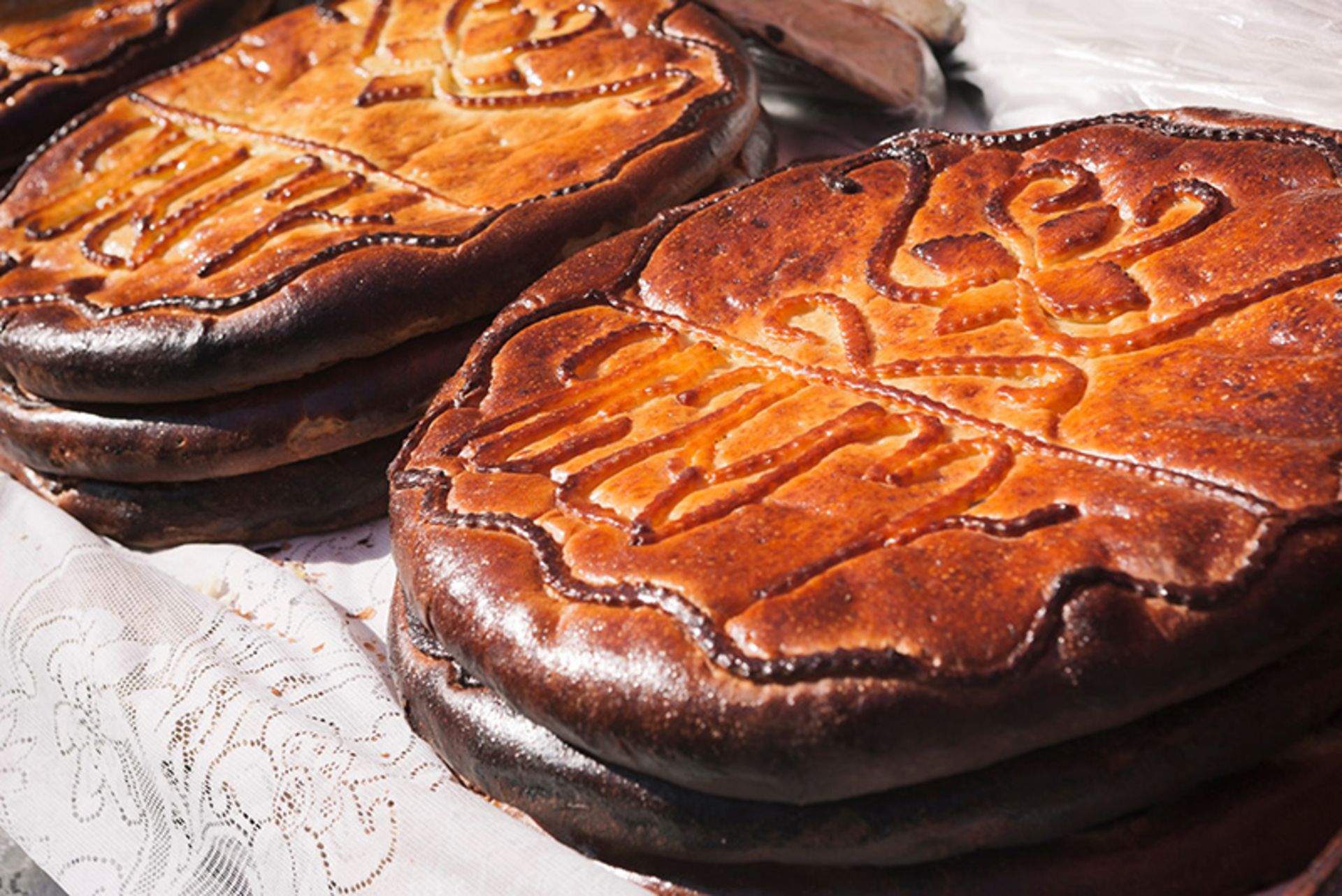 The letters of an Armenian alphabet carved on bread