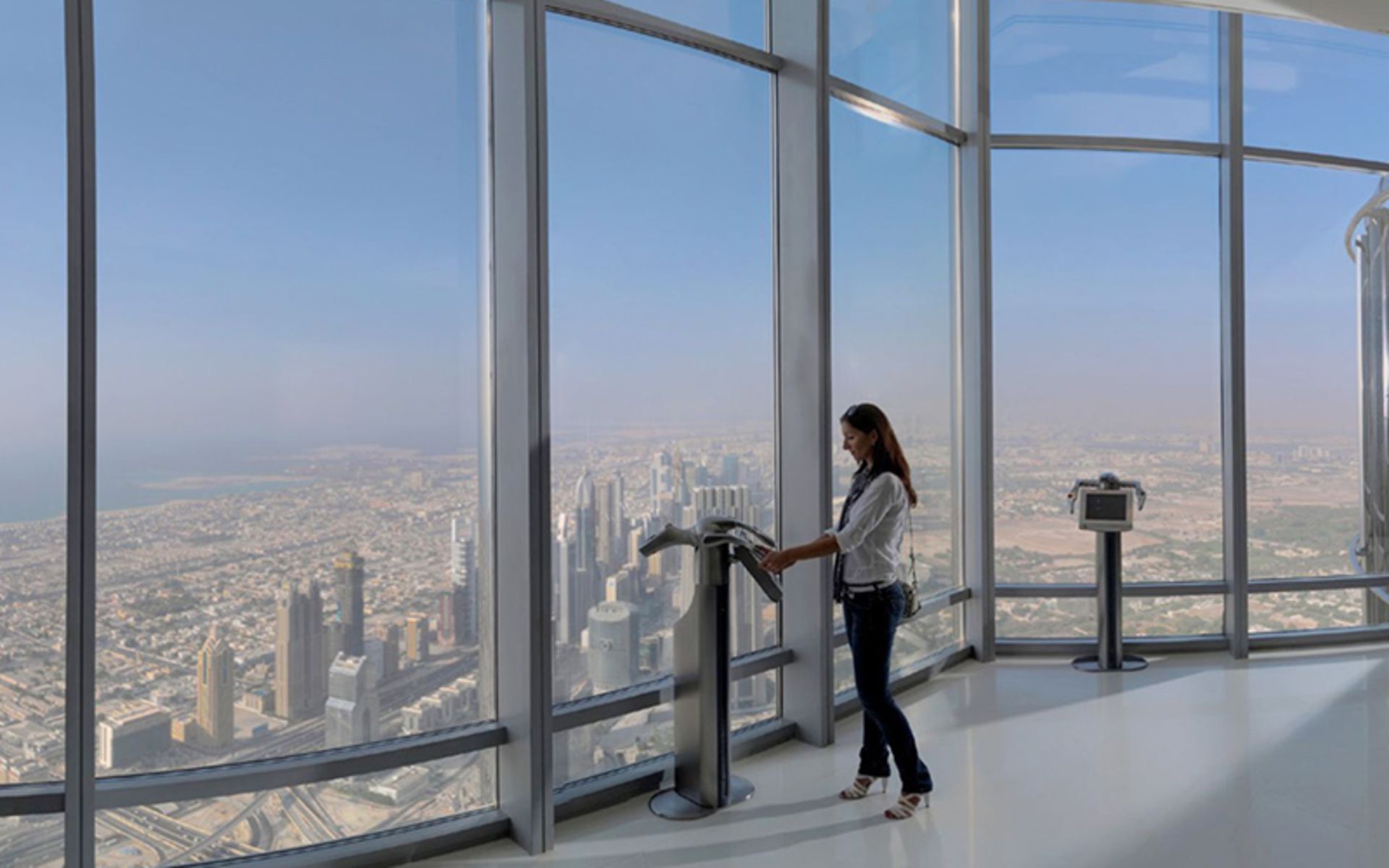 Tourist woman on the platform viewing the caliph tower