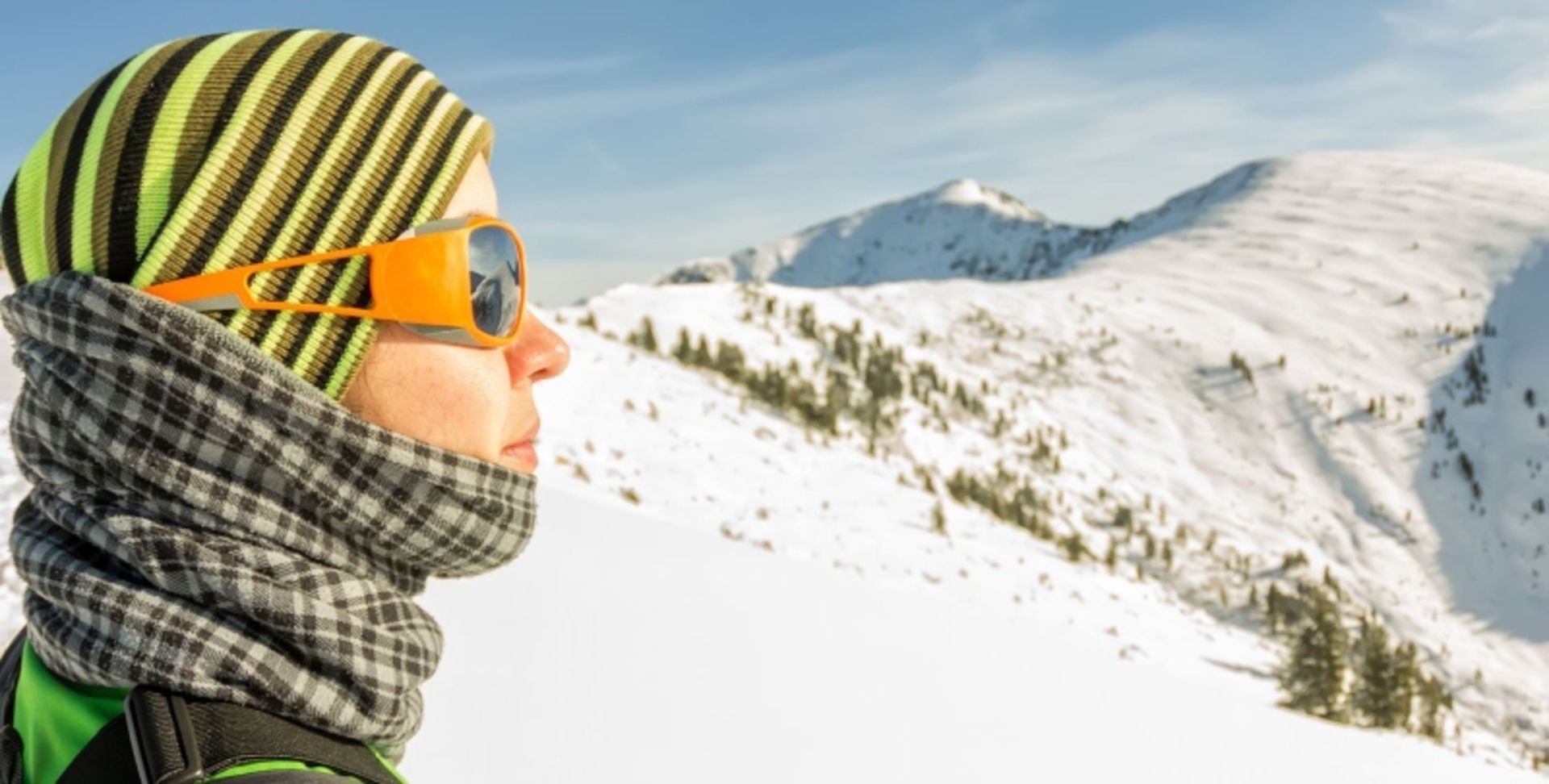 Tourist Woman with Scarf in Snowy Mouain