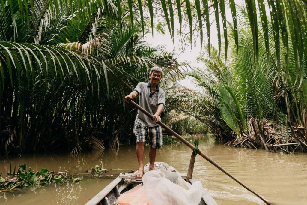 Sampan boat in the Delta McGunegar