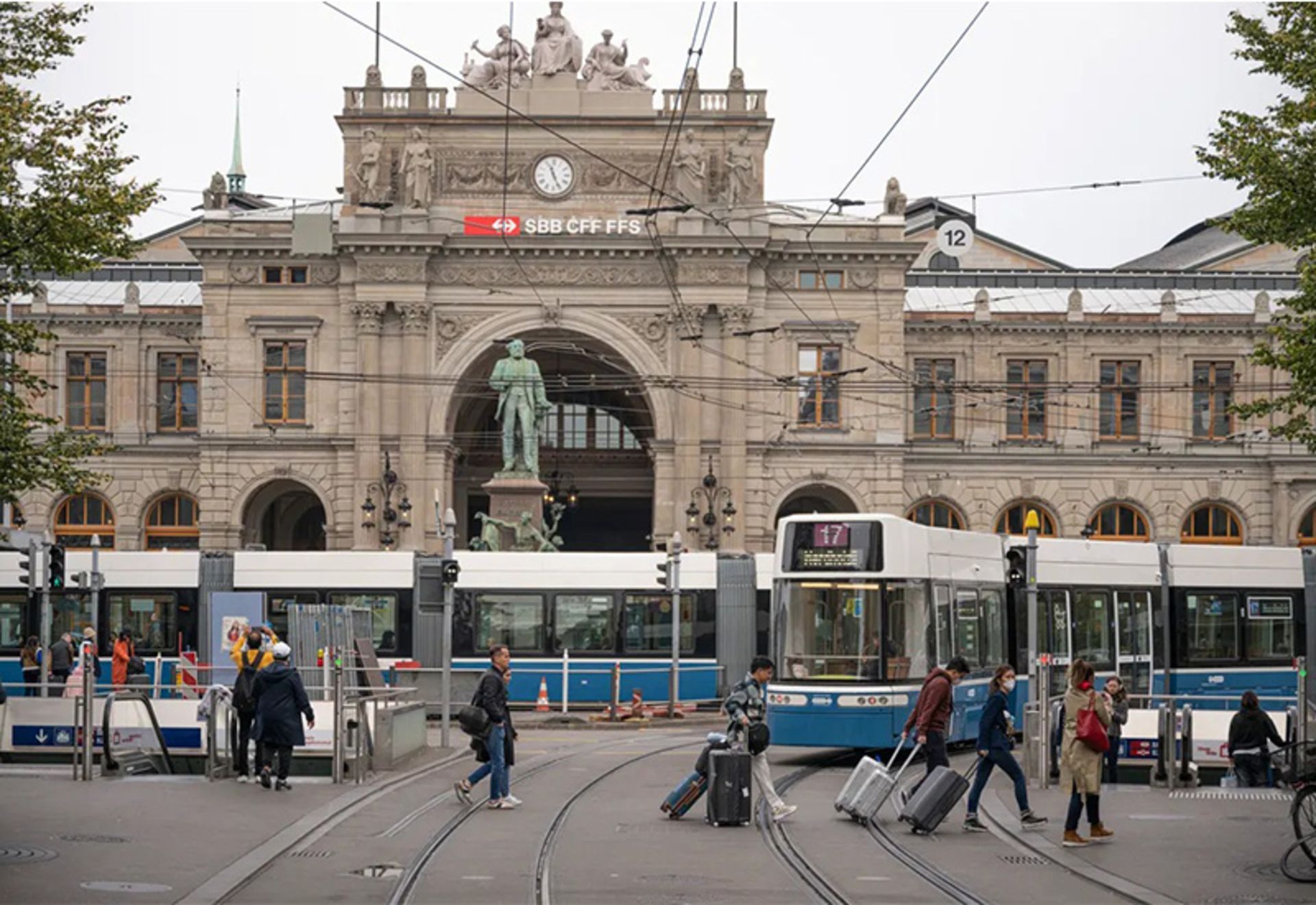 Travelers' traffic next to Zurich Ceral Station train