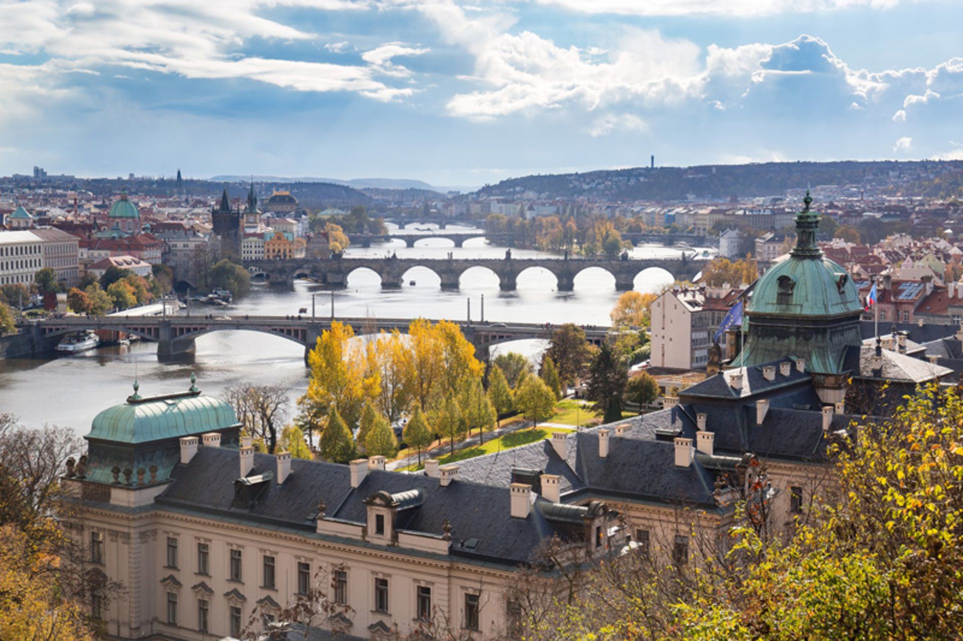 River and bridge in the ceer of the city of Prague