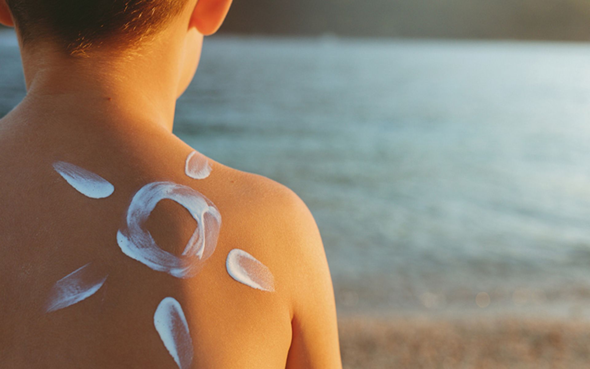 Sunscreen for the baby on the beach