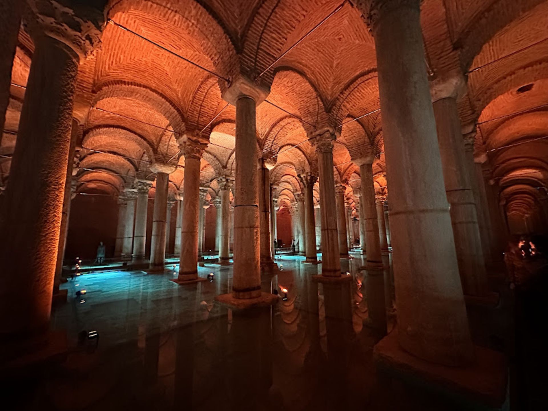 Basilica's waterfro water with red lighting