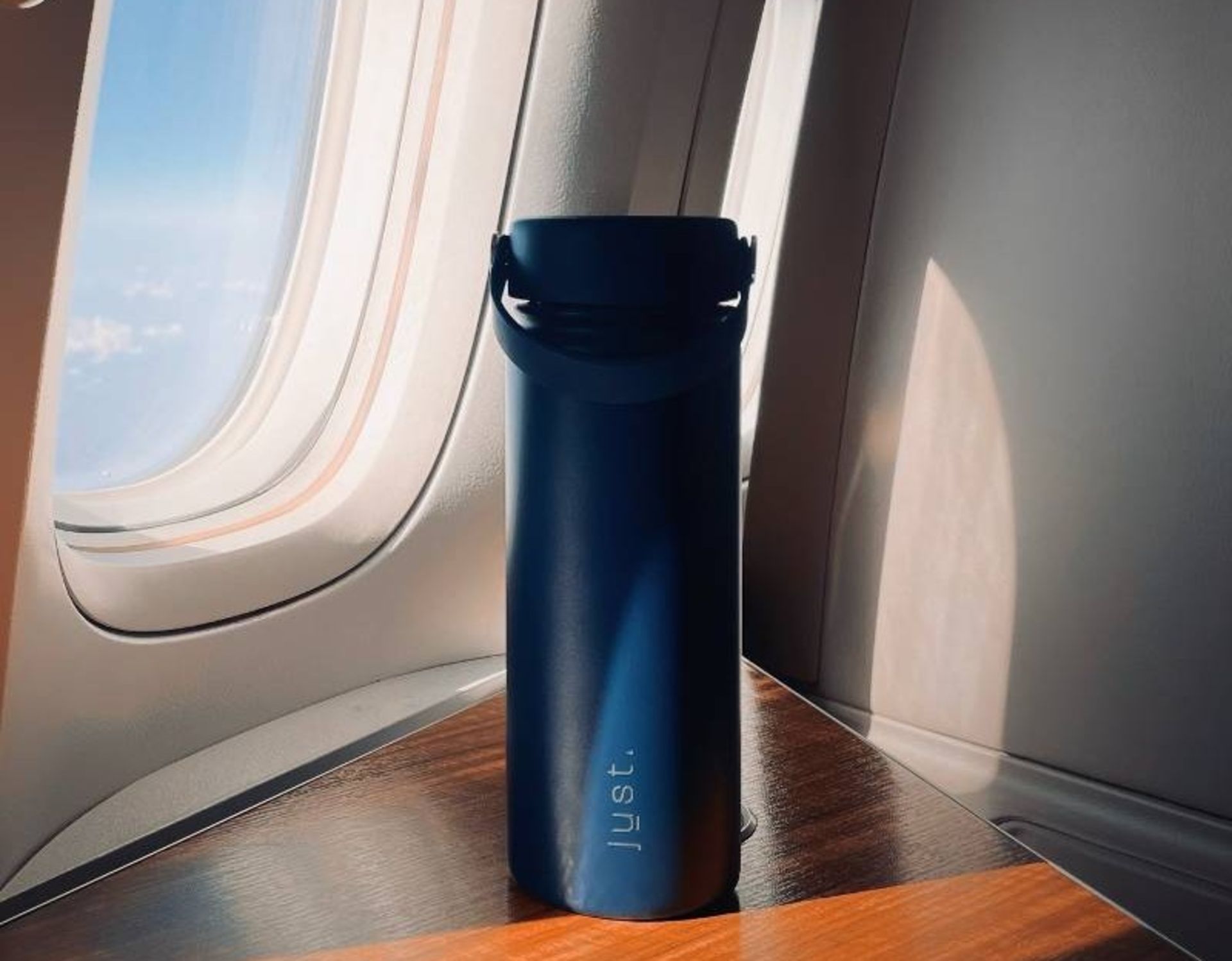 A bottle of water on the plane