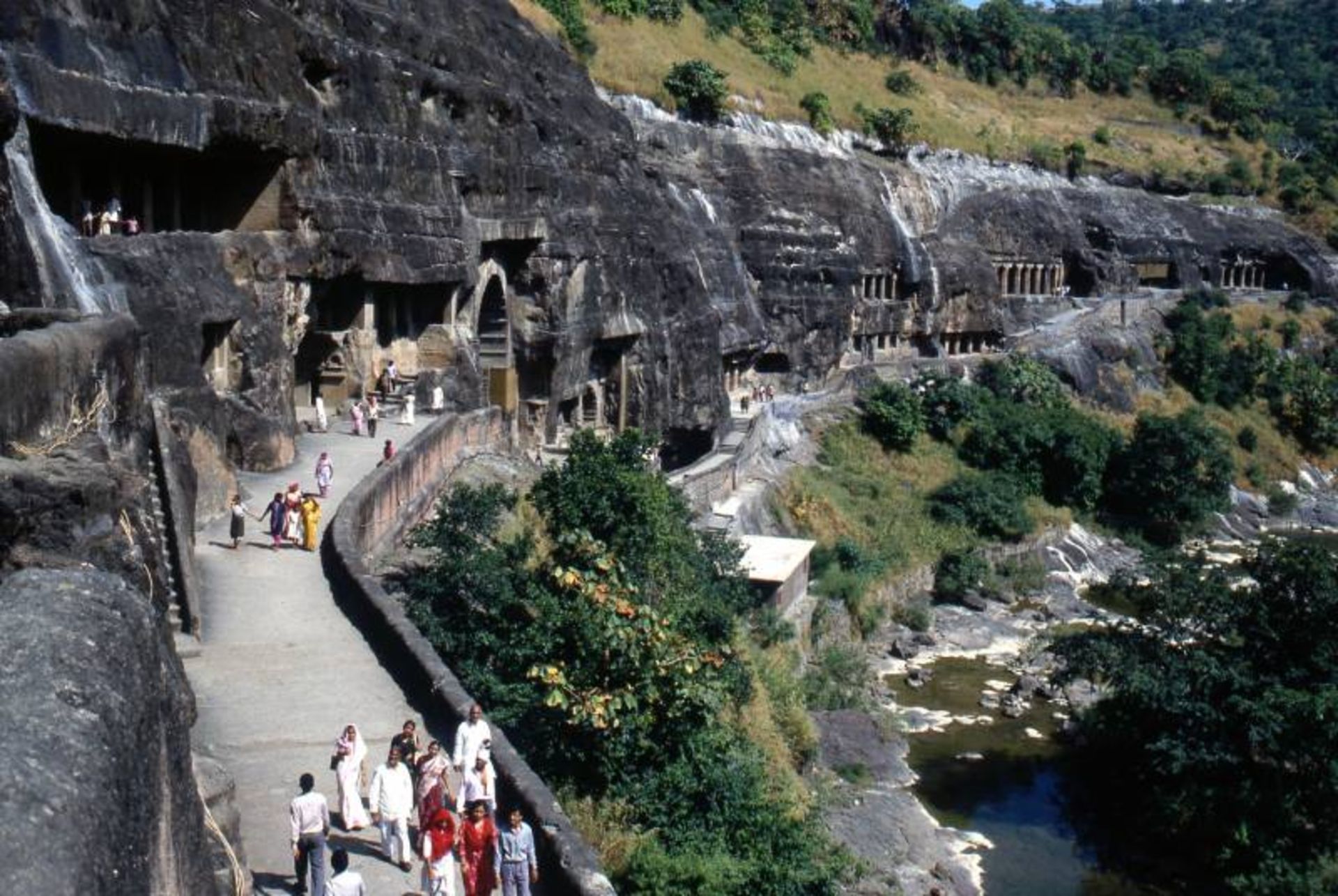 Tourists in the Ajaa caves outside the Indian caves