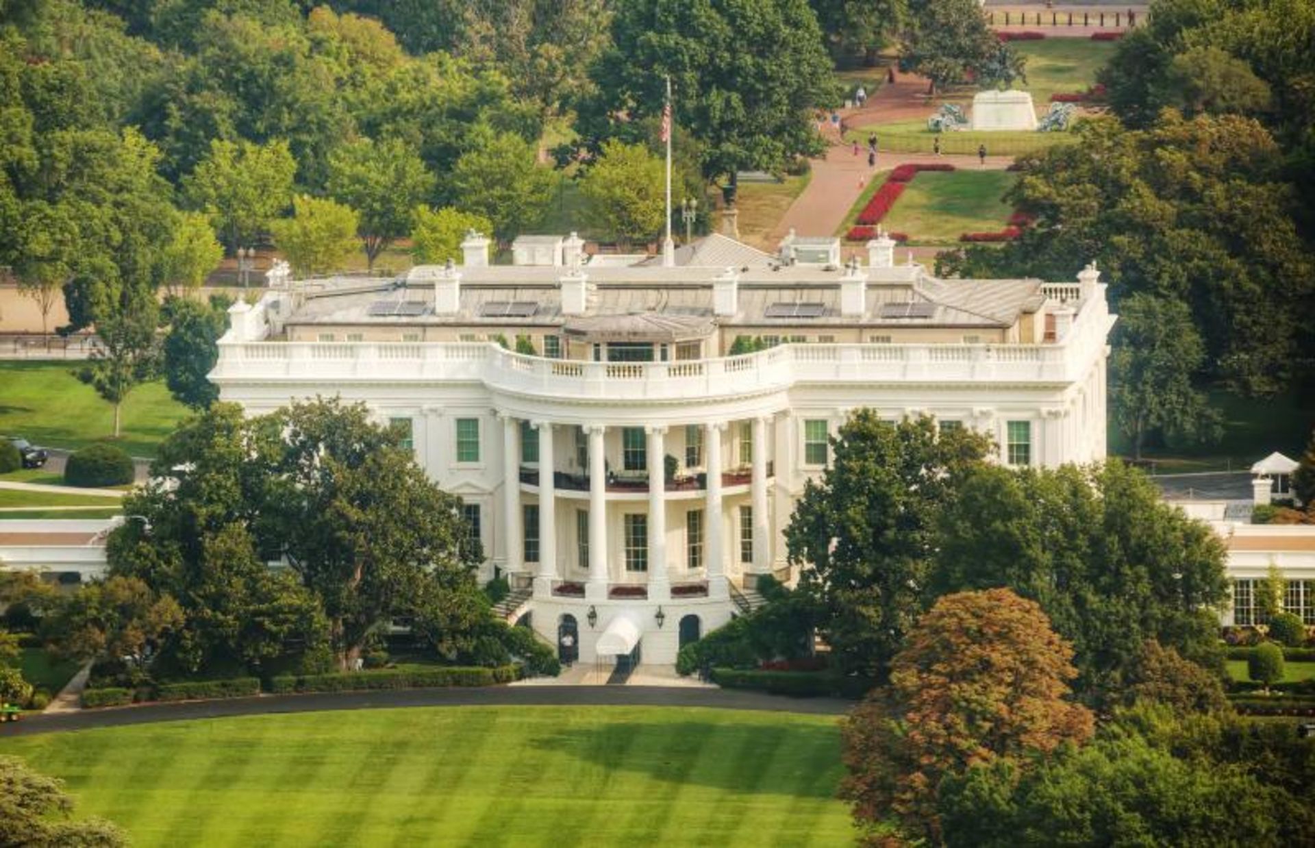 White House on sunny day, trees and grass