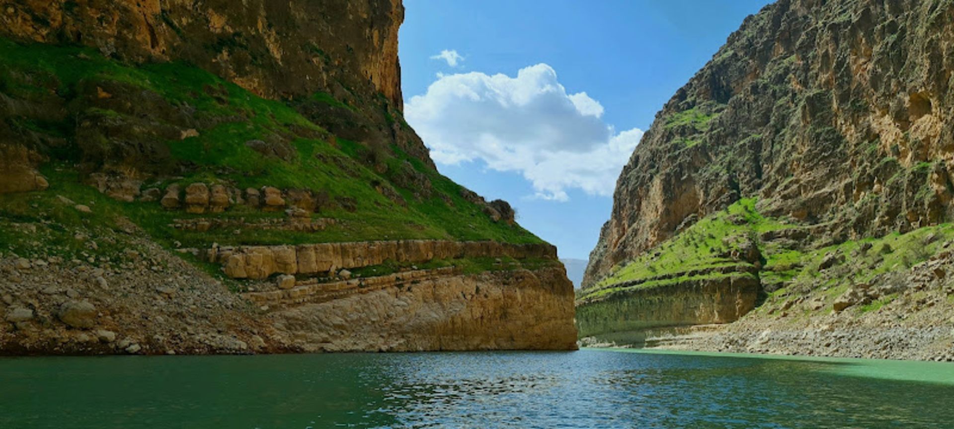 Kafrin Strait with the river and the green cliffs