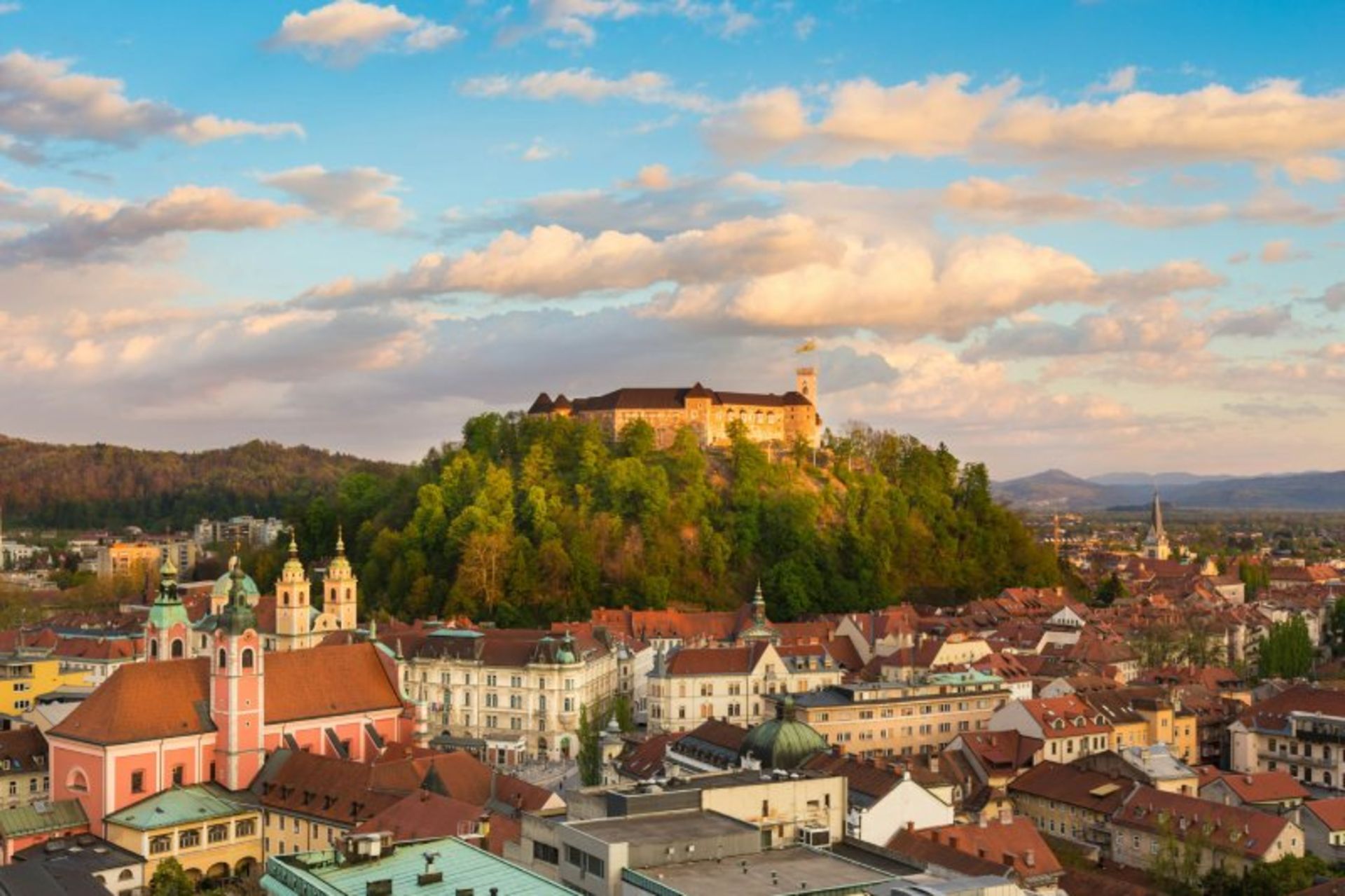 Liobeliana Castle on a lush hill among the houses