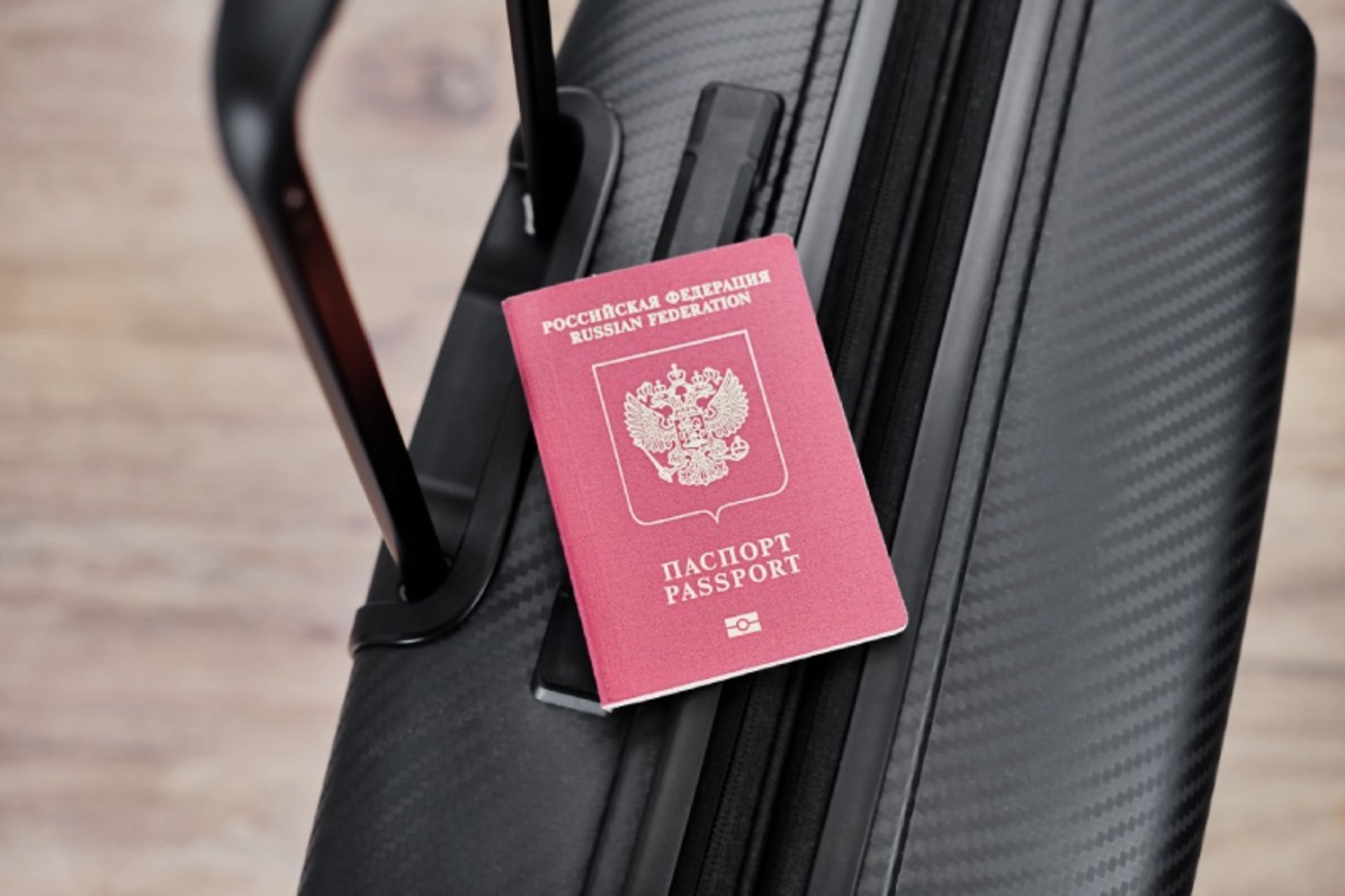 Russian electronic passport red on black luggage