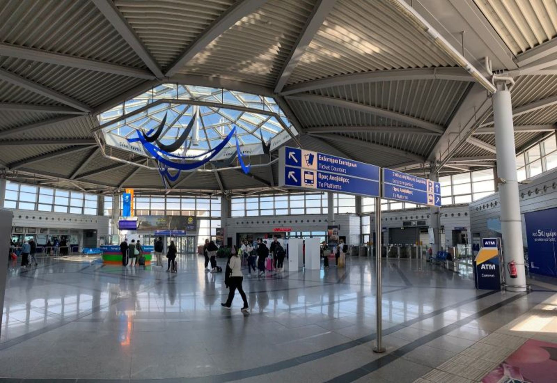 Passengers in the ierior of the Aleftrius Venice Airport 