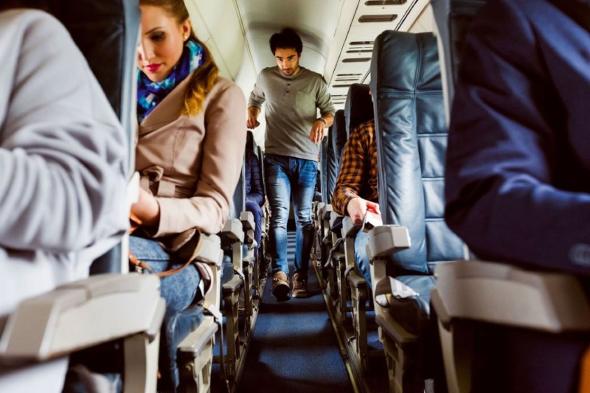Man walking inside the plane