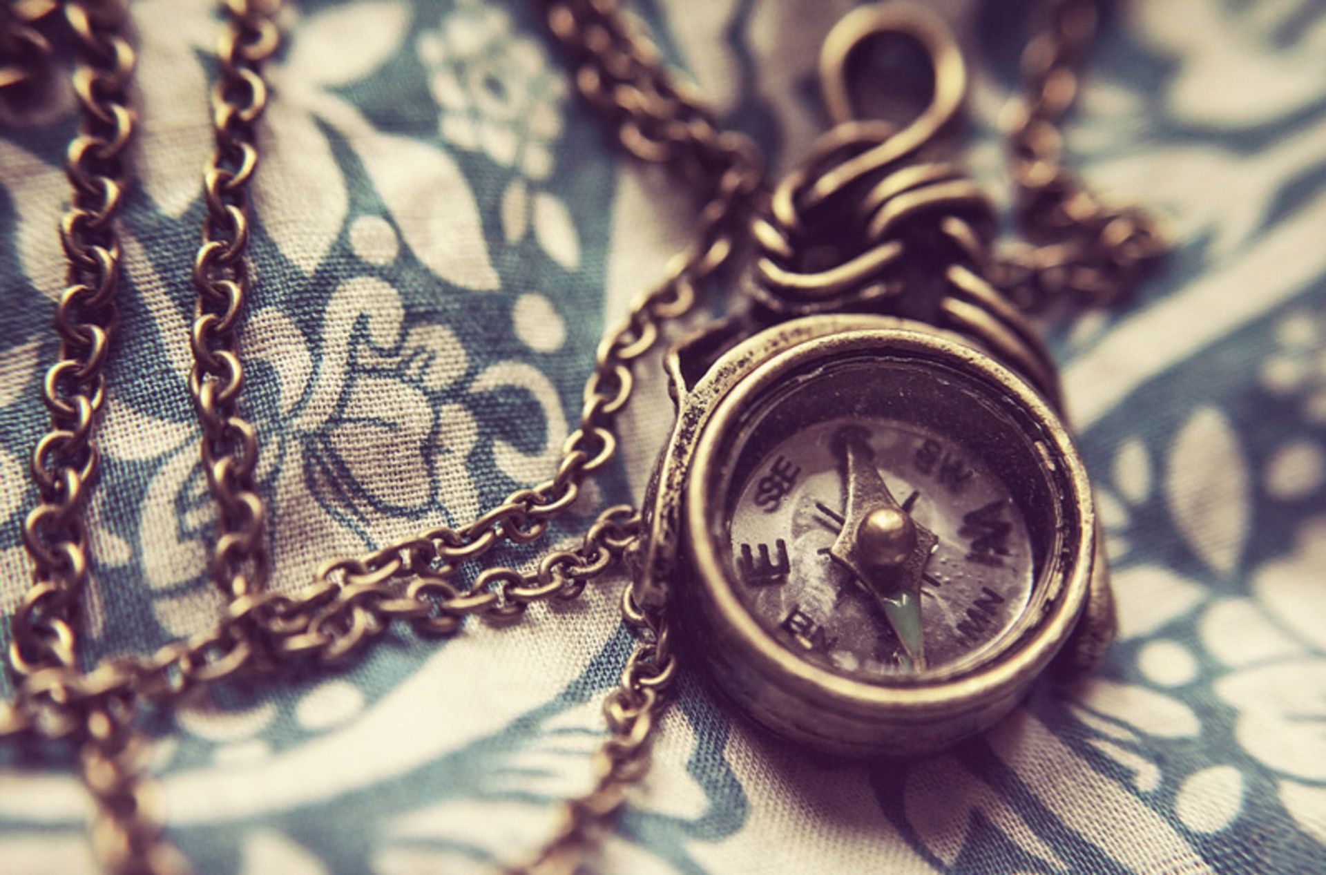 The old compass with golden chains