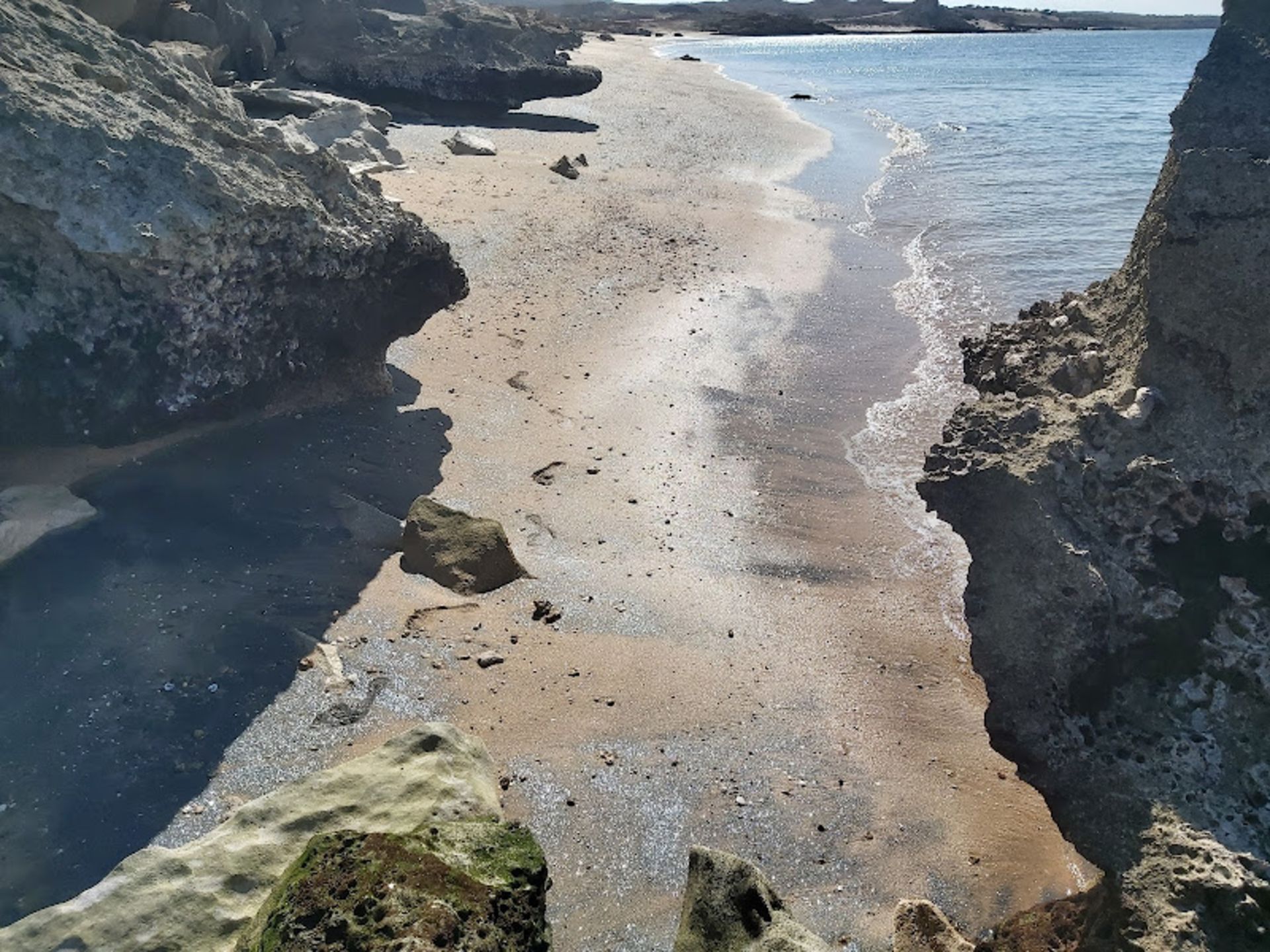 Sands shine on the island's silver coast when