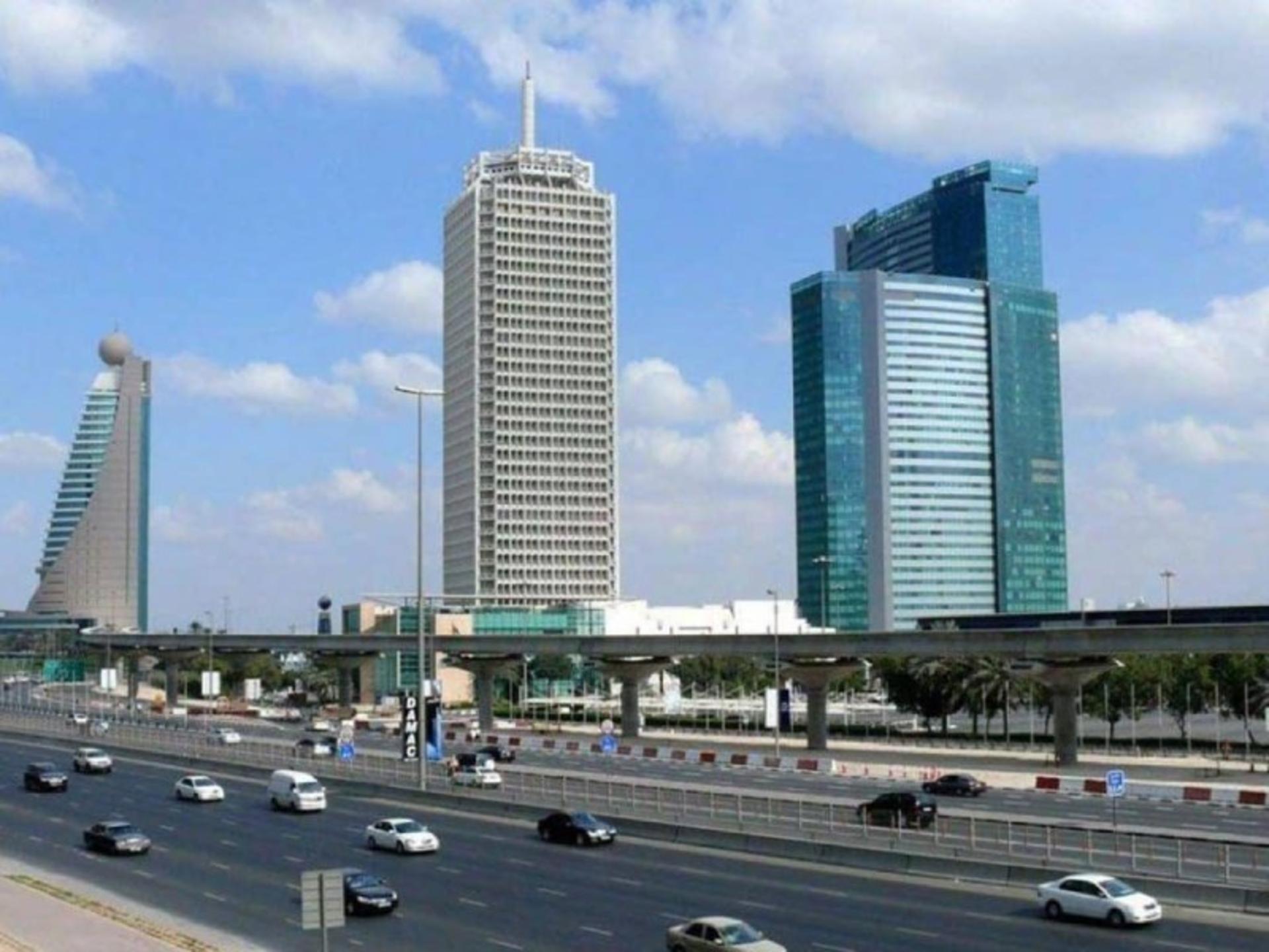 Dubai World Trade Ceer building and modern buildings surrounding it