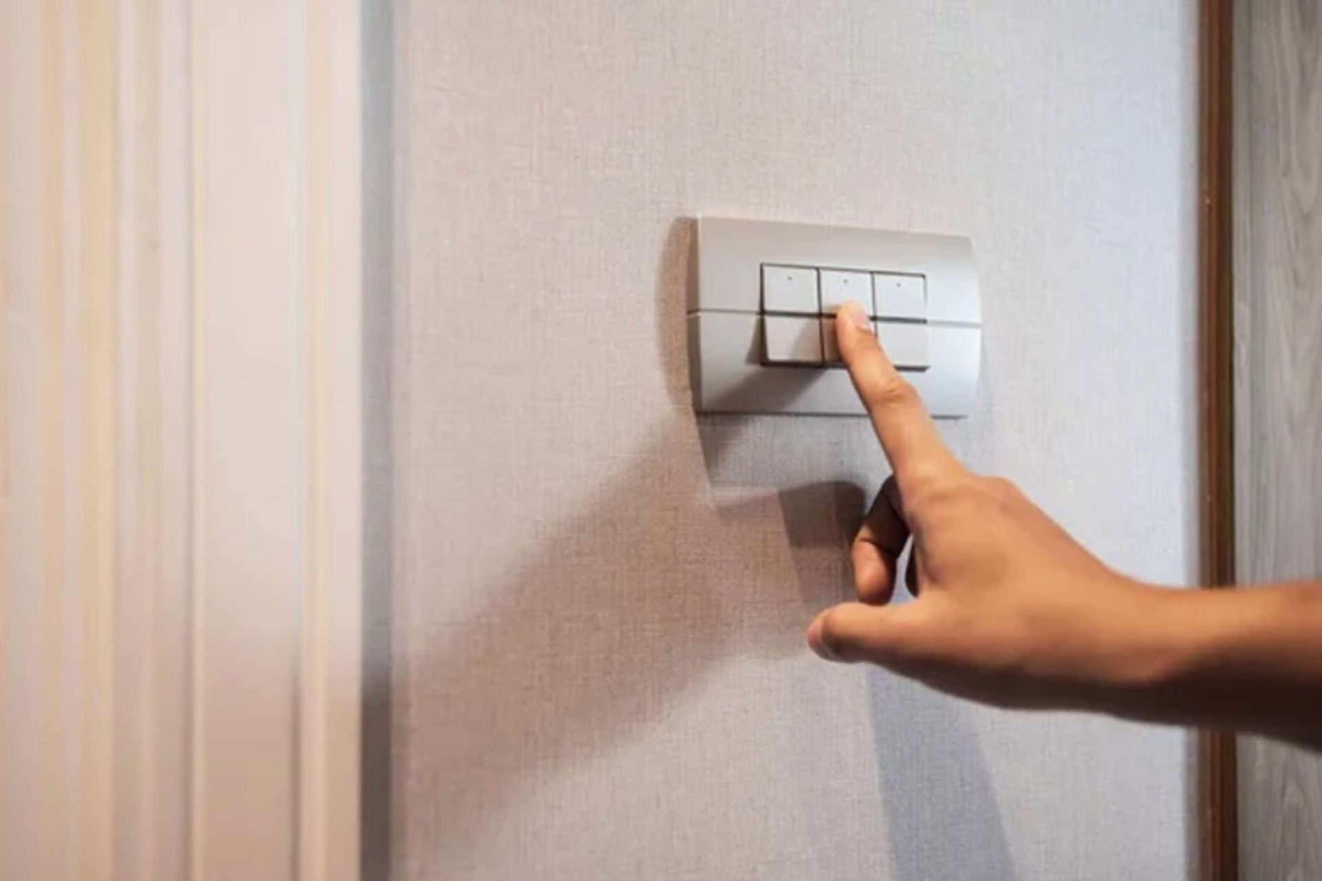 Person turning off the power key