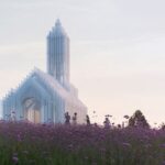 Tourists next to the shadowed church